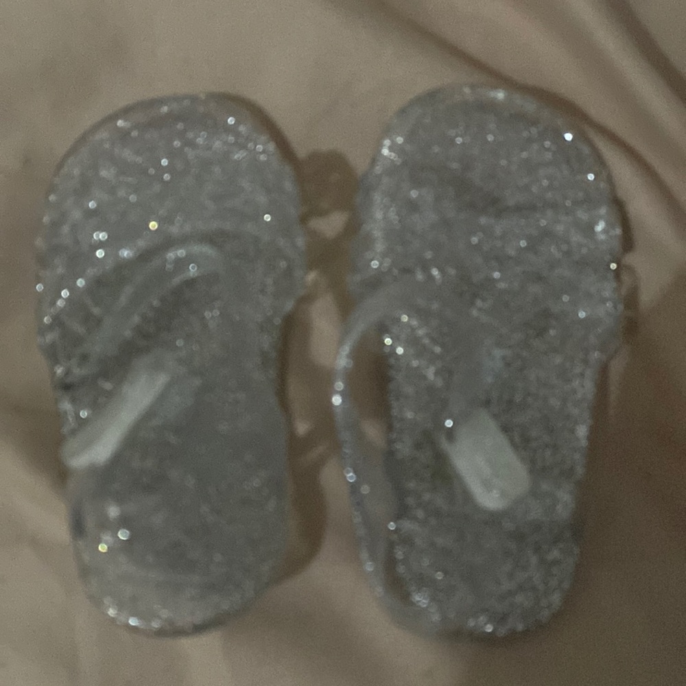 These sandals are from old navy. Never worn.It’ has glitter very affordable.